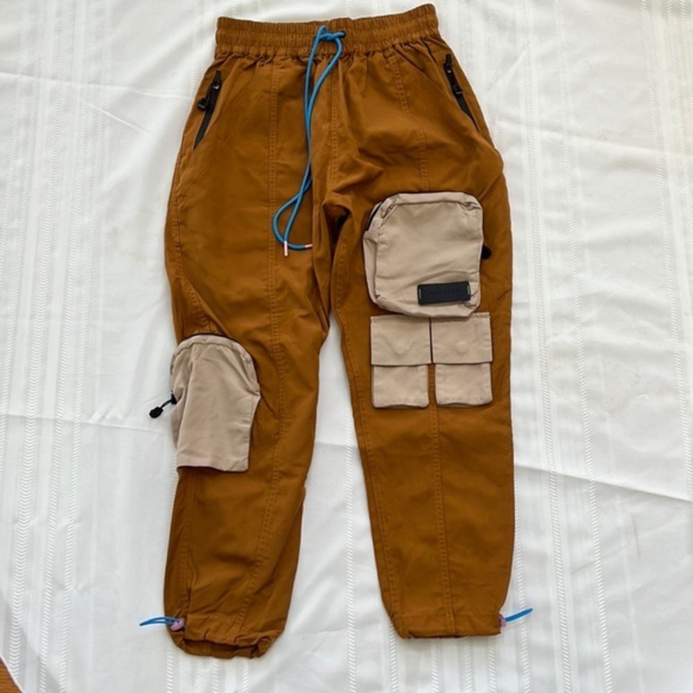 John Geiger Bungy Pants NWOT Color Copper with Tan Pockets Size Medium